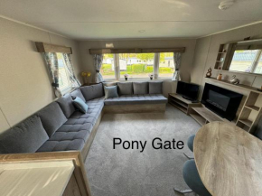Pony Gate Caravan on Haggerstone Castle West Lawn